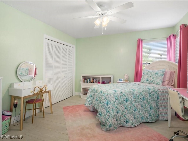 bedroom featuring a ceiling fan and a closet