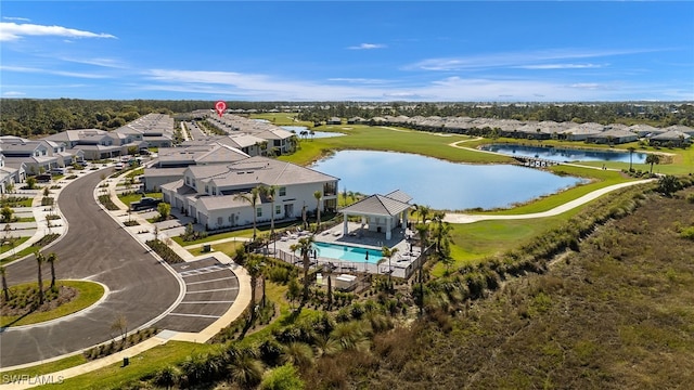 aerial view with a residential view and a water view