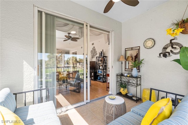 interior space featuring a ceiling fan