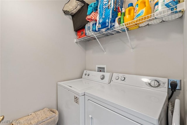 washroom with laundry area and separate washer and dryer