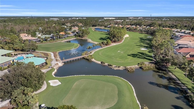 bird's eye view featuring a water view and view of golf course