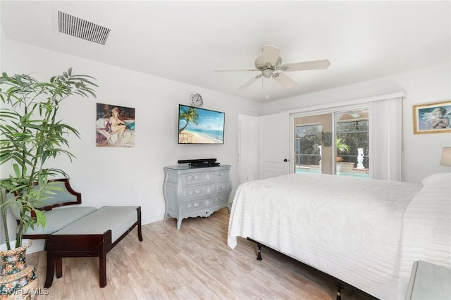 bedroom with access to exterior, light wood-type flooring, visible vents, and a ceiling fan