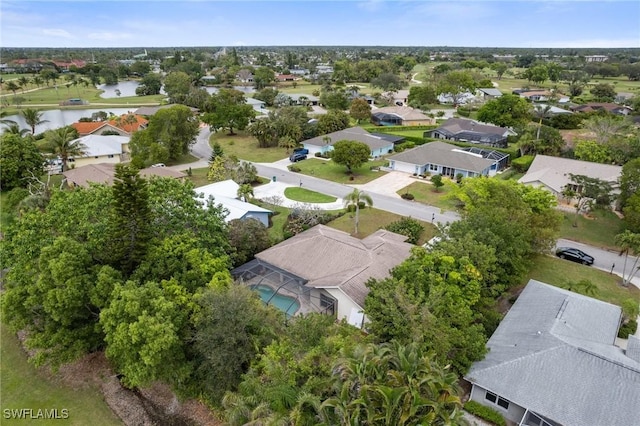 aerial view with a water view and a residential view