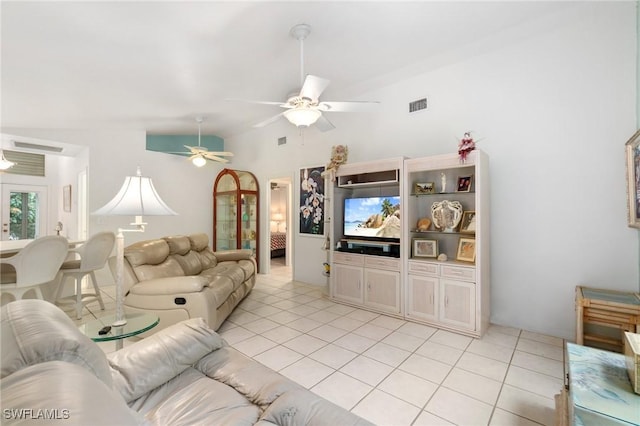 living room with vaulted ceiling, ceiling fan, light tile patterned flooring, and visible vents