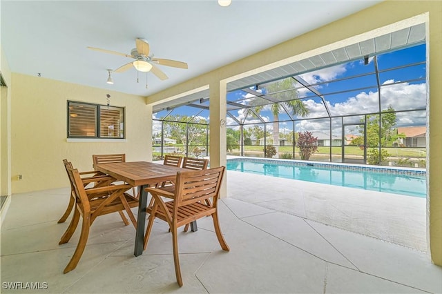 dining room featuring a sunroom