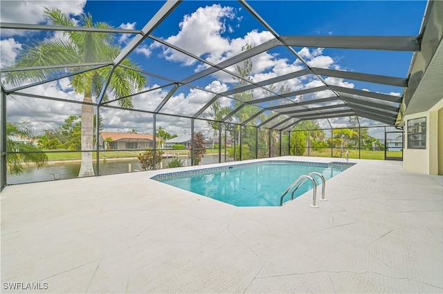 pool with a lanai, a water view, and a patio