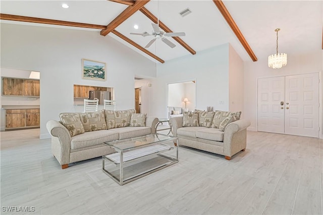 living room featuring baseboards, visible vents, beamed ceiling, light wood-type flooring, and high vaulted ceiling