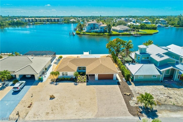 aerial view featuring a water view and a residential view