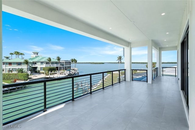 balcony featuring a water view