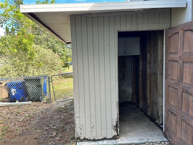 view of outdoor structure featuring fence