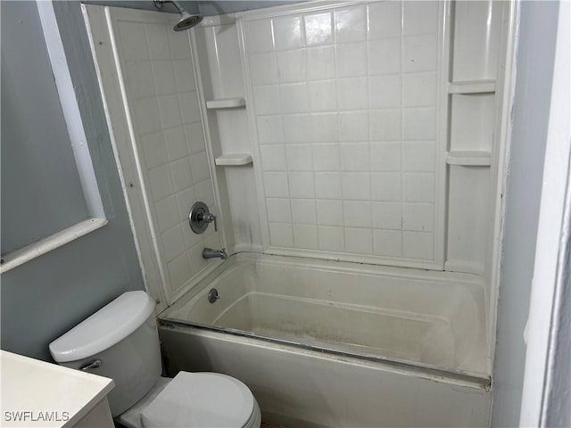 bathroom with toilet, shower / bathtub combination, and vanity