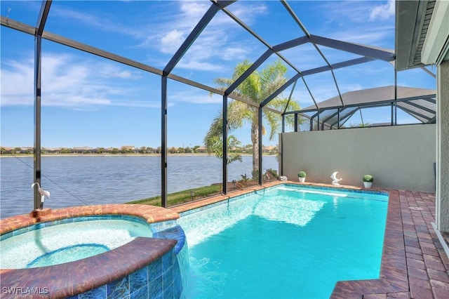 view of swimming pool featuring a water view, glass enclosure, a pool with connected hot tub, and a patio area