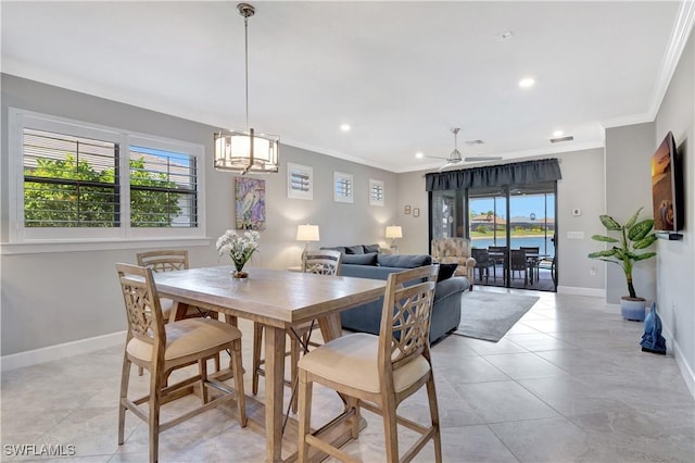 dining space featuring light tile patterned floors, recessed lighting, visible vents, baseboards, and ornamental molding