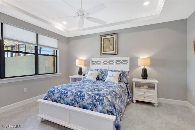 bedroom featuring ornamental molding, a tray ceiling, baseboards, and recessed lighting