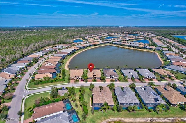 aerial view featuring a residential view and a water view