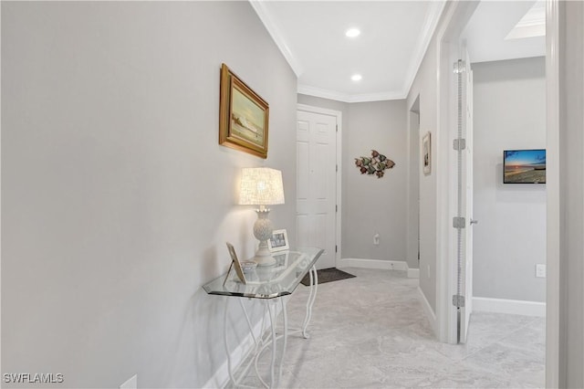 hall featuring marble finish floor, baseboards, ornamental molding, and recessed lighting