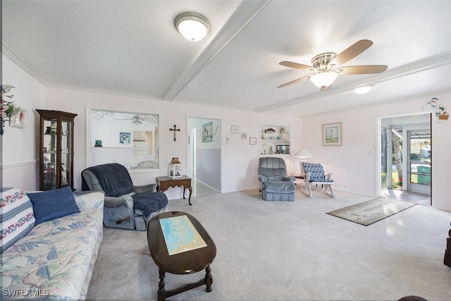 living room featuring carpet, baseboards, ceiling fan, and beam ceiling