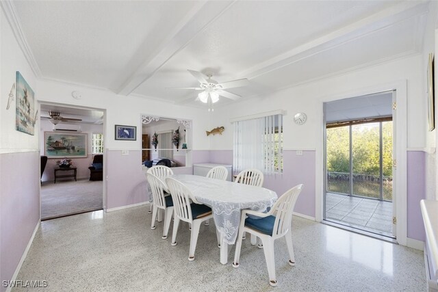 dining space featuring a wall mounted AC, baseboards, a ceiling fan, and speckled floor