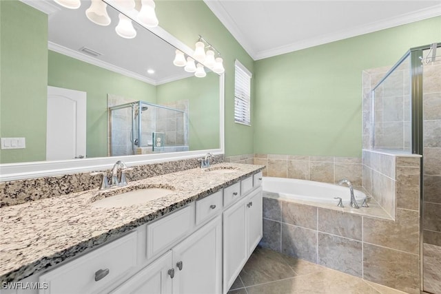 full bathroom with a stall shower, crown molding, visible vents, and a sink