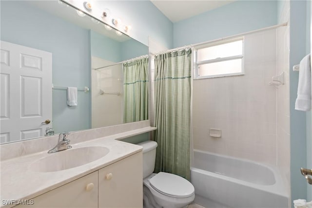 bathroom featuring vanity, toilet, and shower / tub combo with curtain