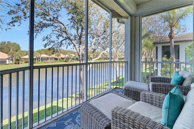 sunroom with a water view