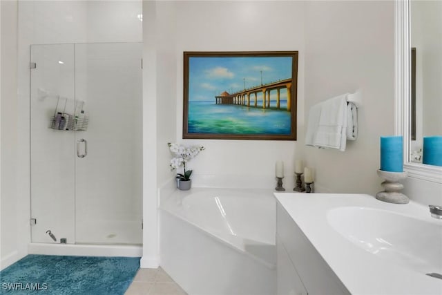 bathroom featuring vanity, tile patterned flooring, a shower stall, and a bath