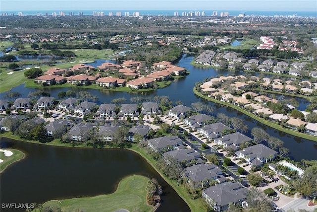 bird's eye view featuring a water view, a residential view, and golf course view