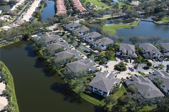 aerial view featuring a water view and a residential view