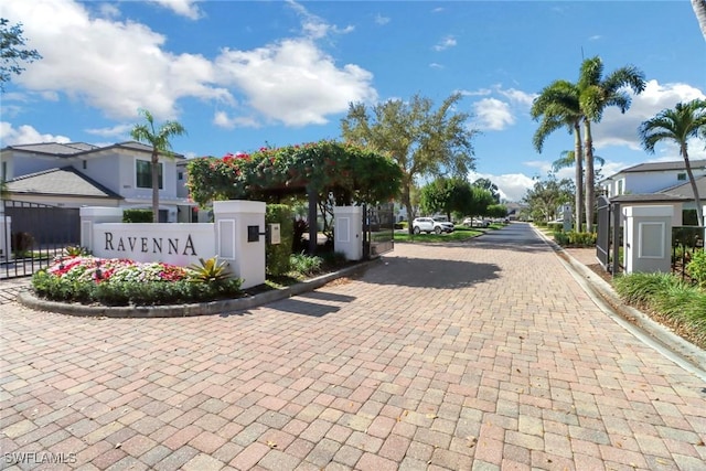 view of street with a residential view and curbs