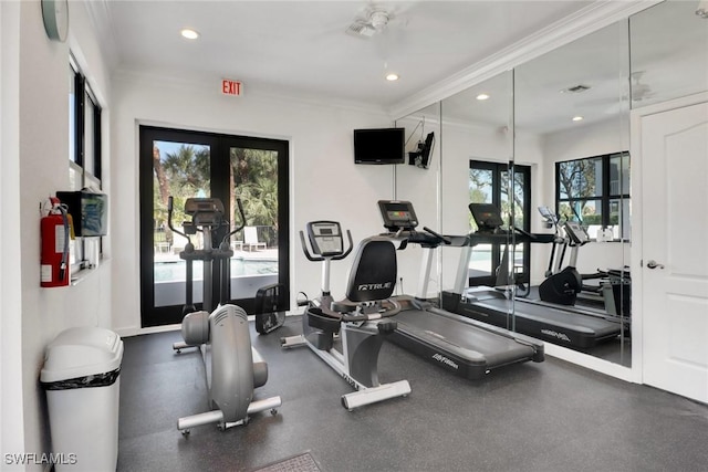 workout area featuring crown molding, french doors, visible vents, and recessed lighting