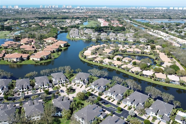 aerial view featuring a water view and a residential view