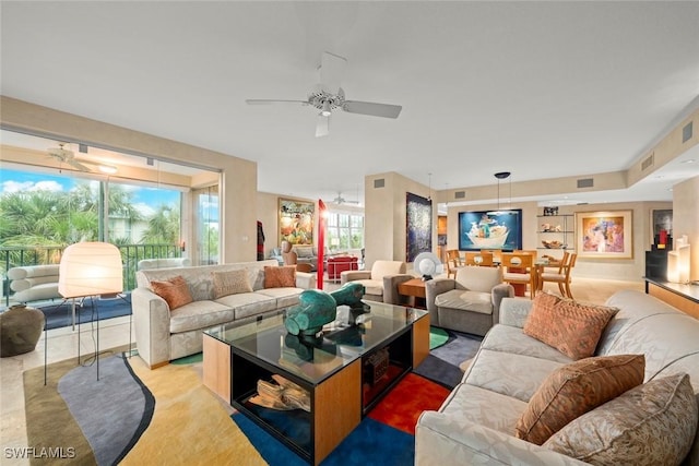 2619 Wulfert Rd Unit 6, Sanibel, FL 33957 - living room featuring visible vents and a ceiling fan