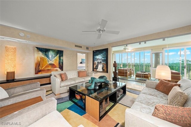 2619 Wulfert Rd Unit 6, Sanibel, FL 33957 - living area featuring visible vents and a ceiling fan