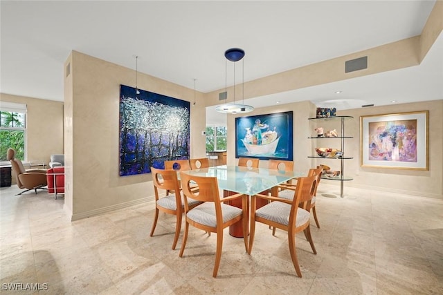 2619 Wulfert Rd Unit 6, Sanibel, FL 33957 - dining area featuring visible vents and baseboards