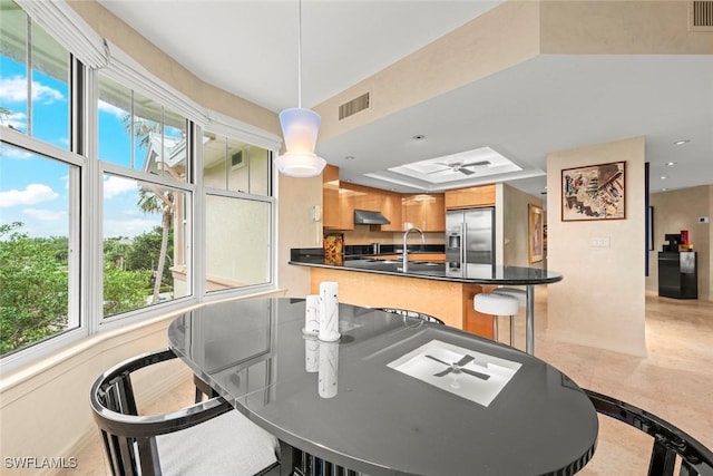 2619 Wulfert Rd Unit 6, Sanibel, FL 33957 - dining area featuring visible vents and a ceiling fan