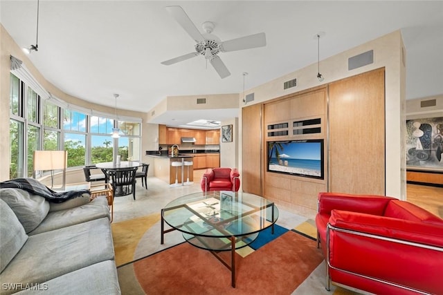 2619 Wulfert Rd Unit 6, Sanibel, FL 33957 - living room featuring a ceiling fan, visible vents, and concrete floors