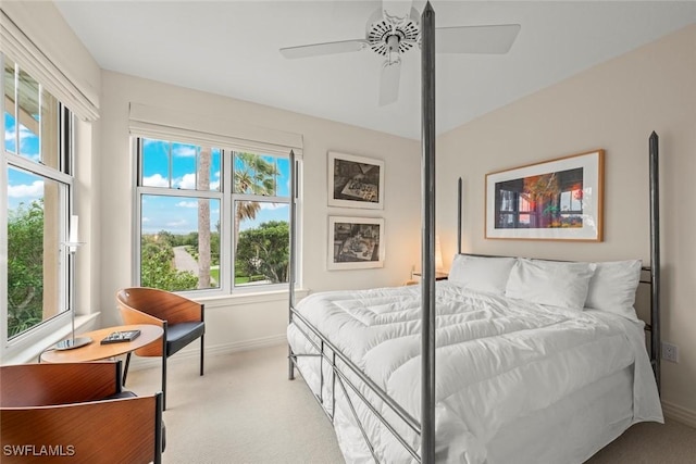 2619 Wulfert Rd Unit 6, Sanibel, FL 33957 - bedroom featuring light carpet, ceiling fan, and baseboards