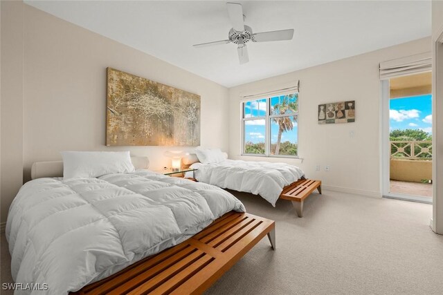 2619 Wulfert Rd Unit 6, Sanibel, FL 33957 - carpeted bedroom featuring access to exterior, ceiling fan, and baseboards