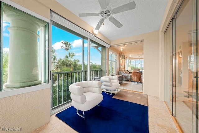 2619 Wulfert Rd Unit 6, Sanibel, FL 33957 - sunroom / solarium with a ceiling fan