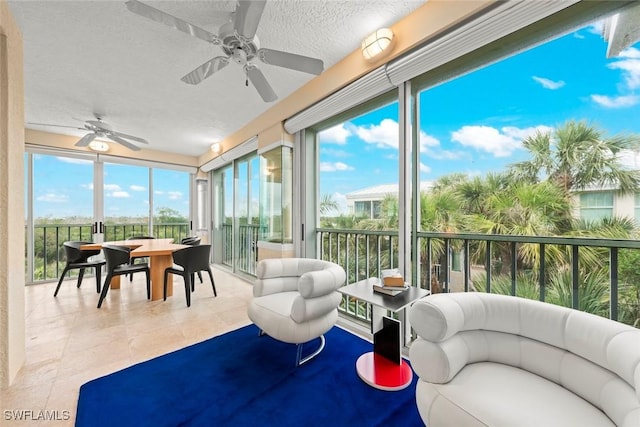2619 Wulfert Rd Unit 6, Sanibel, FL 33957 - sunroom with a ceiling fan and a healthy amount of sunlight