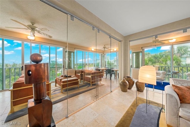 2619 Wulfert Rd Unit 6, Sanibel, FL 33957 - sunroom with a ceiling fan