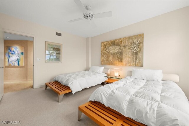 2619 Wulfert Rd Unit 6, Sanibel, FL 33957 - bedroom featuring ceiling fan, visible vents, and light colored carpet