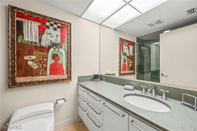 2619 Wulfert Rd Unit 6, Sanibel, FL 33957 - bathroom featuring toilet, visible vents, vanity, and baseboards