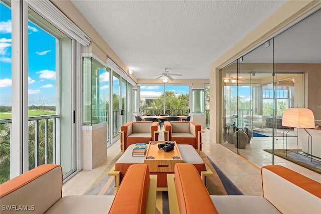 2619 Wulfert Rd Unit 6, Sanibel, FL 33957 - sunroom / solarium featuring ceiling fan
