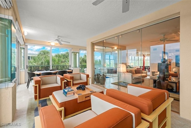 2619 Wulfert Rd Unit 6, Sanibel, FL 33957 - sunroom featuring ceiling fan and plenty of natural light