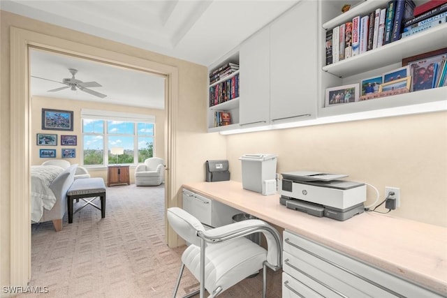 2619 Wulfert Rd Unit 6, Sanibel, FL 33957 - office area with light carpet, ceiling fan, and built in study area