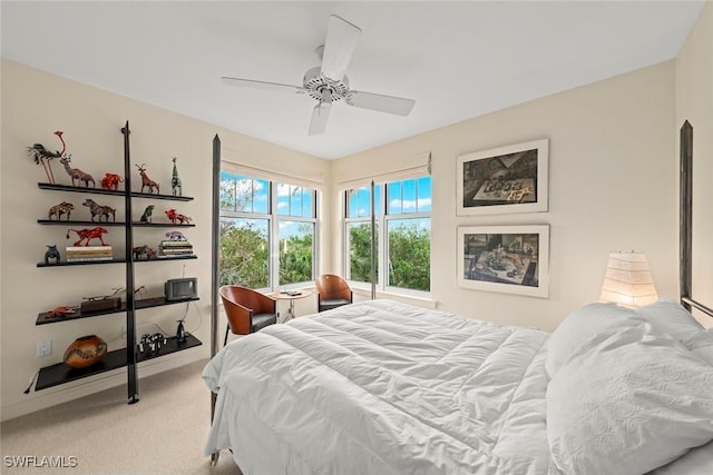 2619 Wulfert Rd Unit 6, Sanibel, FL 33957 - bedroom with a ceiling fan and carpet flooring