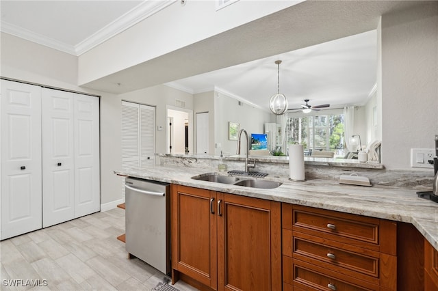 kitchen featuring stainless steel dishwasher, brown cabinetry, a sink, and light stone counters