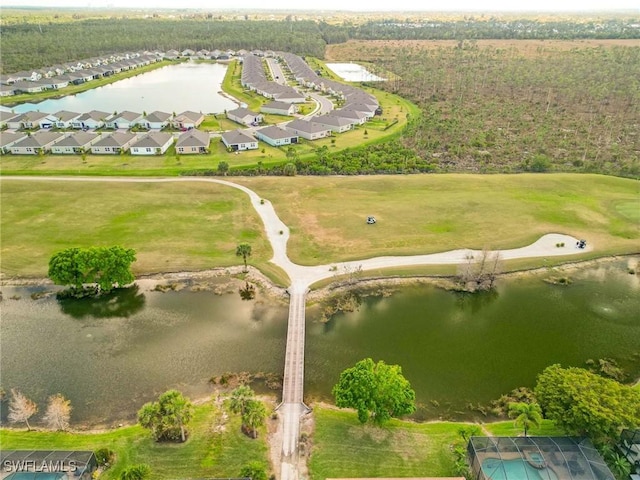 aerial view featuring a water view and a residential view