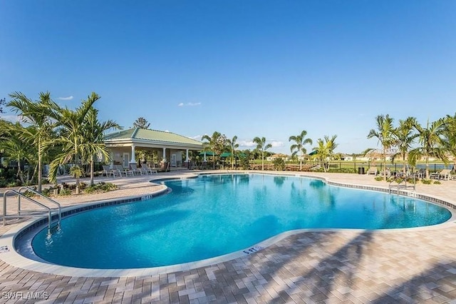 community pool featuring a patio